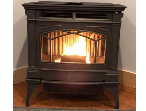 Regency Hampton Pellet Stove with fire burning inside it