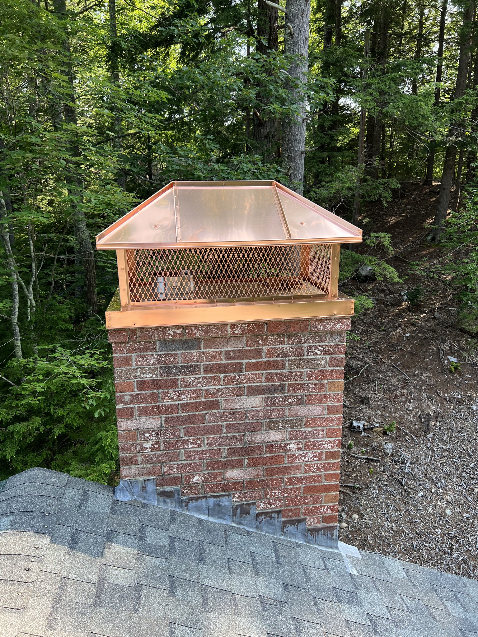 copper-chimney-cap-replacement-sanford-maine.jpg Copper chimney cap replacement on brick chimney in Sanford Maine by Frechette Chimney Sweeping
